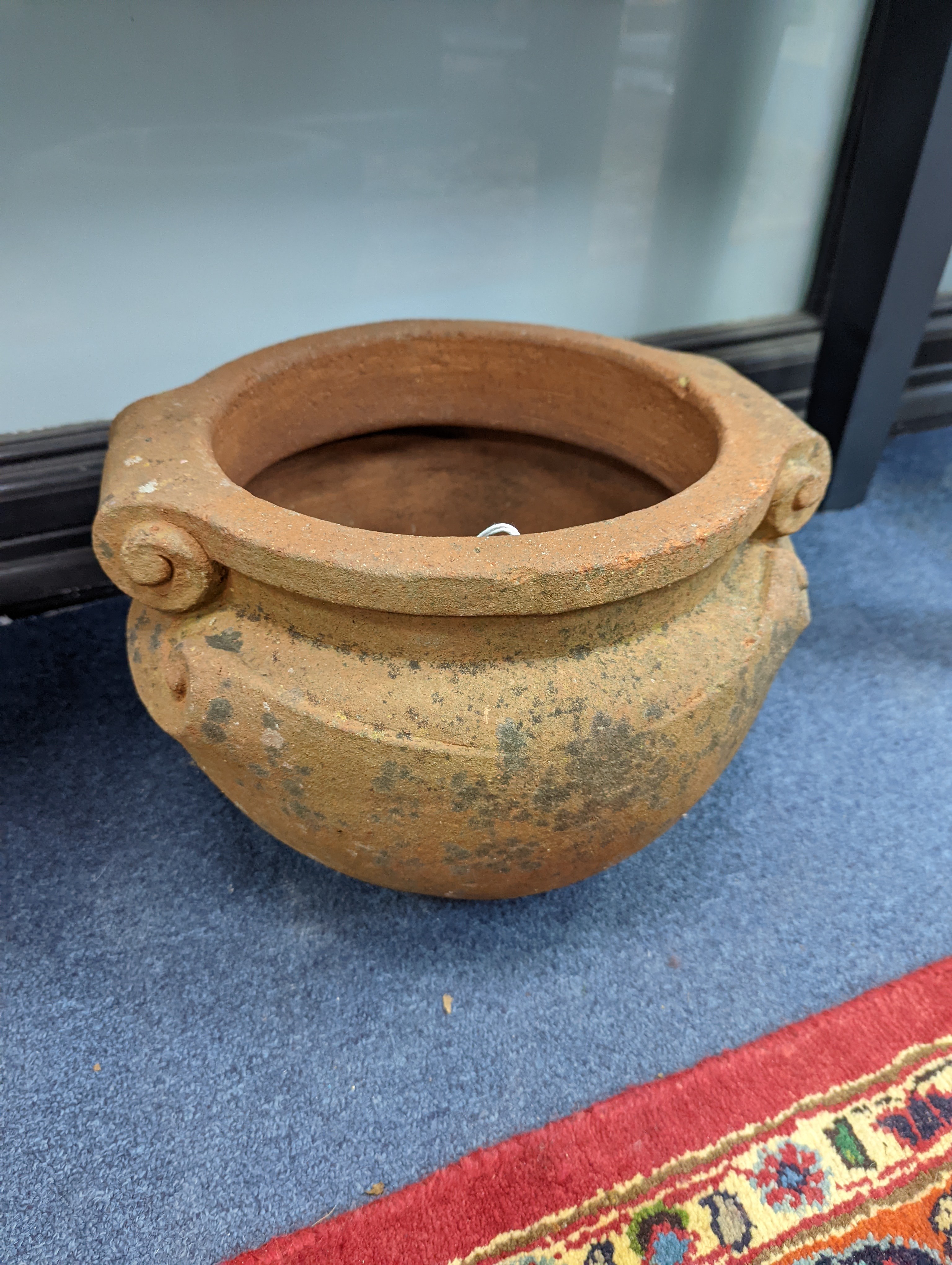 A pair of Compton terracotta planters, diameter 32cm, height 24cm